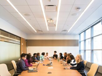 A multicultural team brainstorming and collaborating during a business meeting.